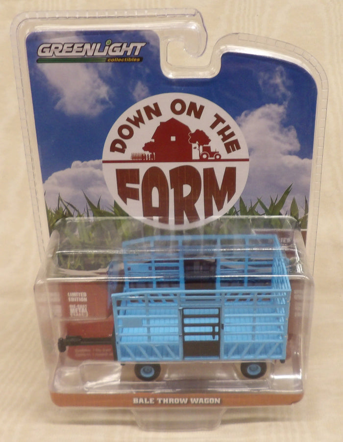 #48100-F 1/64 Light Blue & Black Bale Throw Wagon